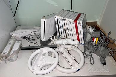 Ninentendo Wii Bianca + 12 Giochi + Accessori