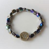 Bracciale elastico con ciondolo sole