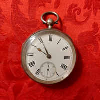 Antico orologio da tasca in argento