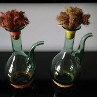 Caraffe di vetro con tappo di paglia