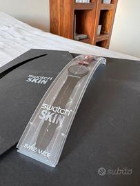 Swatch Skin Dimension e Libro