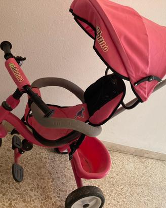 Truciclo rosa con manubrio