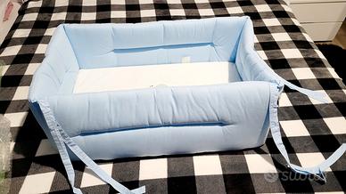 Riduttore per lettino neonato.