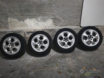 cerchi in lega con gomme per alfa romeo 147