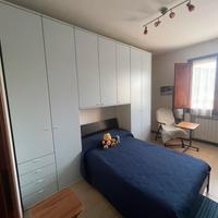 Camera armadio e letto