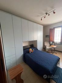 Camera armadio e letto
