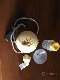 Tiralatte, scalda biberon, radiolina