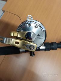 mulinello trainaMitchell2030 con canna Olympus 12