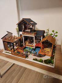 Casa in miniatura con luci