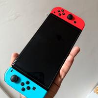 Nintendo switch Oled + due giochi