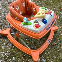 Girello per bambino arancione con giochi