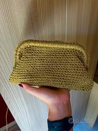 Pochette gioiello dorata fatta a mano