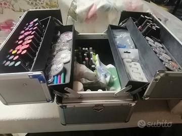 Valigia, accessori e Lampada UV