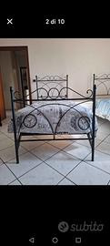 letti singoli in ferro battuto con materasso e ret