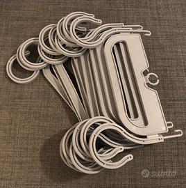 10 supporti in plastica sacche urina da letto