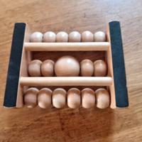 Rollo in legno massaggiatore per piedi. 