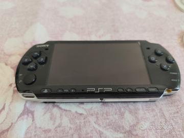 PsP con 9 giochi , perfettamente Funzionante 