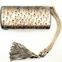 Borsetta rigida con fiorellini smaltati e  nappa