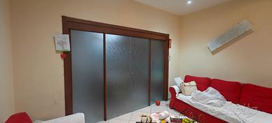 Porta a scrigno in vetro