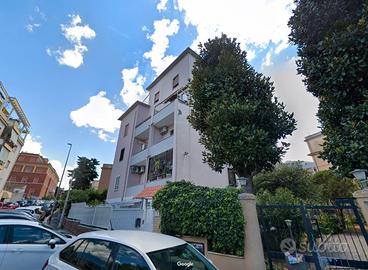 Mentana bilocale con giardino e posto auto