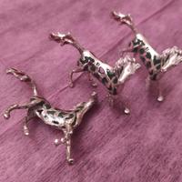 Tre cavalli in argento