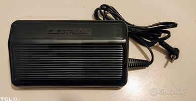 Piedino per macchina da cucire.