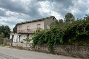 Casa con terreno edificabile
