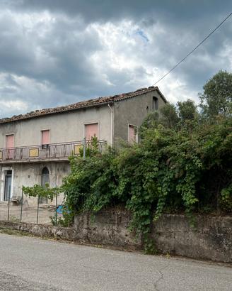 Casa con terreno edificabile