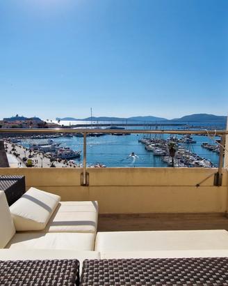 Attico con affaccio unico sul porto di Alghero