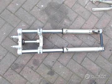 X REV 3 270 : forcella forcellone pompa pattino