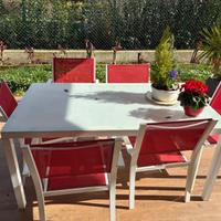 Tavolo da giardino in vetro con sedie