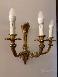 Coppia applique in legno dorato