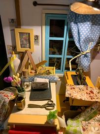 sartoria in miniatura e fruttivendolo in miniatura