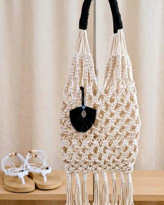 L’Eleganza dei Nodi: La Tua Estate in un Intreccio