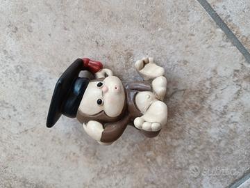 Statuetta scimmia laurea