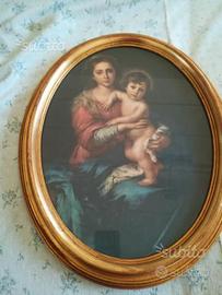 Cornice ovale laccata oro