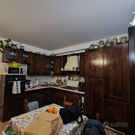 Appartamento a piano terra con due balconi