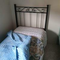 lettino in ferro battuto con rete e materasso