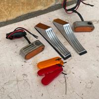 Frecce anteriori e posteriori per Harley + vetrini