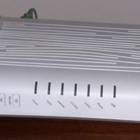 1 MODEM FIBRA, E 1 CORDLESS PHILIPS  