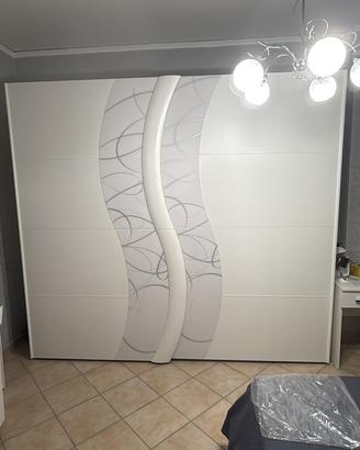 Armadio comò e 2 comodini più letto