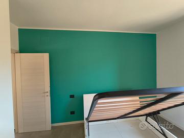 Letto matrimoniale con doghe e cassettone