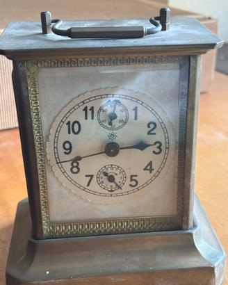 Orologio da tavolo i da viaggio, tipo cappuccina.