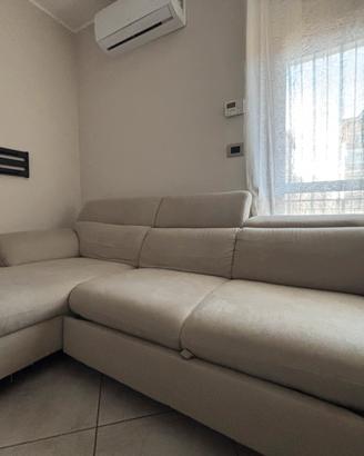DIVANO CON PENISOLA