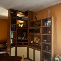 libreria ad angolo  con parere attrezzata