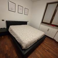 struttura letto contenitore con comodino