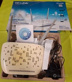 TP-LINK   MODEM ROUTER 300MPS