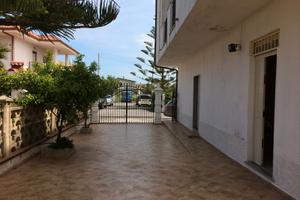 Trilocale con cortile