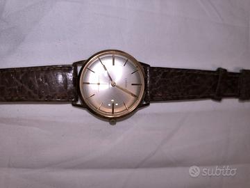 Orologio Carmelit con guscio in oro 18k