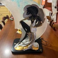 Scultura con lampada Carpie